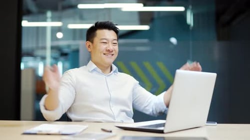 Asian specialist Employee job done Satisfied office worker leaning back businessman relaxing after