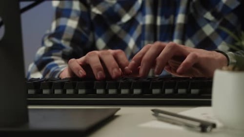 Man Using Computer in Office Businessman Texting on Keyboard Copywriter Professional Programmer