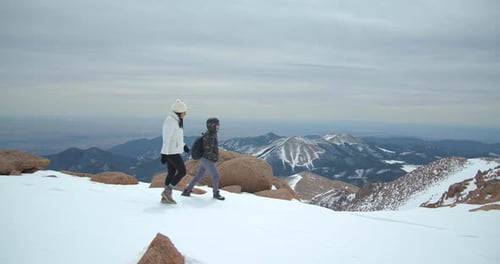 Couple Hiking Summit of Rocky Mountains, Climbing, Hiking Peak Adventure