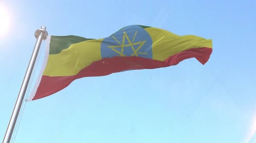 Ethiopian Flag Waving Realistically Against a Clear Blue Sky