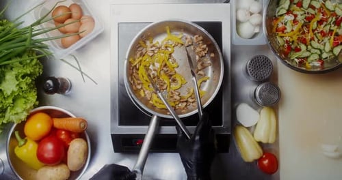 Close-up of a frying pan during frying top view, no people