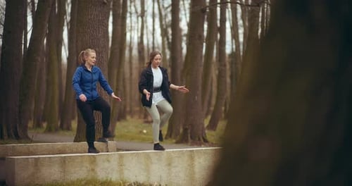 Two Woman Workout Exercising In Park Jogging Fitness