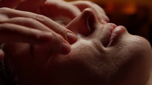 Closeup Facial Massage in Serene Spa Setting with Gentle Touch on Relaxed Woman Skin Promoting