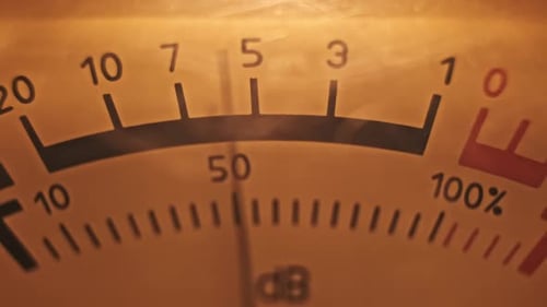 Macro Shot of a VU Meter with a Glowing Scale