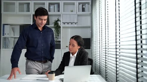 Business Colleagues Working Together in Modern Office