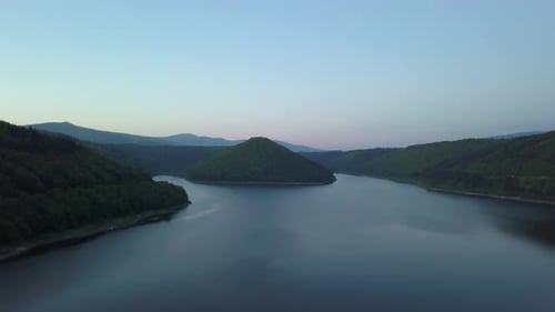 Drone footage of a lake, dam