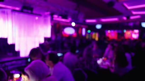 Vibrant Nightclub Scene Contemporary Neonlit Tavern Filled with Engaged Customers at Illuminated
