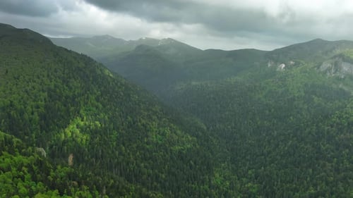 Clouds Over Summer Green Mountains