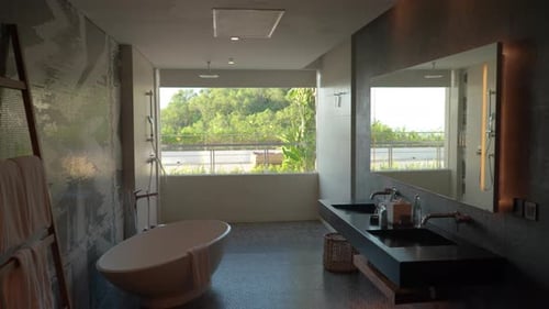 Luxury Hotel Room With Bathtub And Garden View In Uluwatu, Bali, Indonesia. sideways shot