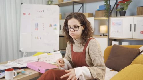 Stressed Young Woman Working from Home