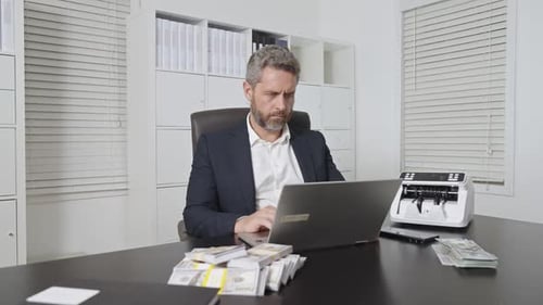 Businessman at Office Desk with Money Counting Machine Finance Expert Banker Money Counting in
