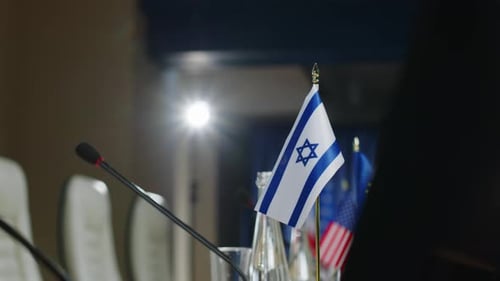 Flag of Israel on Table in Conference Hall