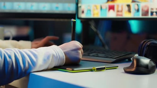 Creative Professional Using Graphic Tablet for Digital Design