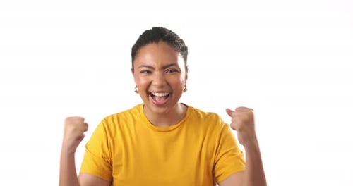Excited Woman Cheering with Arms Raised in Studio