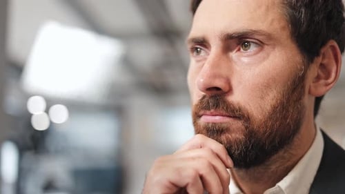 Businessman Contemplates in Office Thoughtful Professional Making Decisions