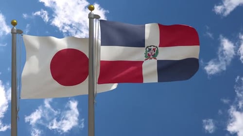 Waving Flags of Japan and Dominican Republic with Blue Sky
