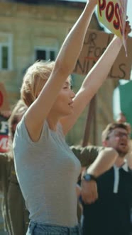 Adults Protesting in a City Street