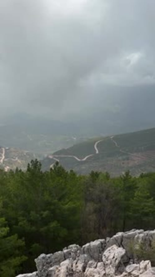 Vertical Video Cloudy Landscape in the Mountains Aerial View