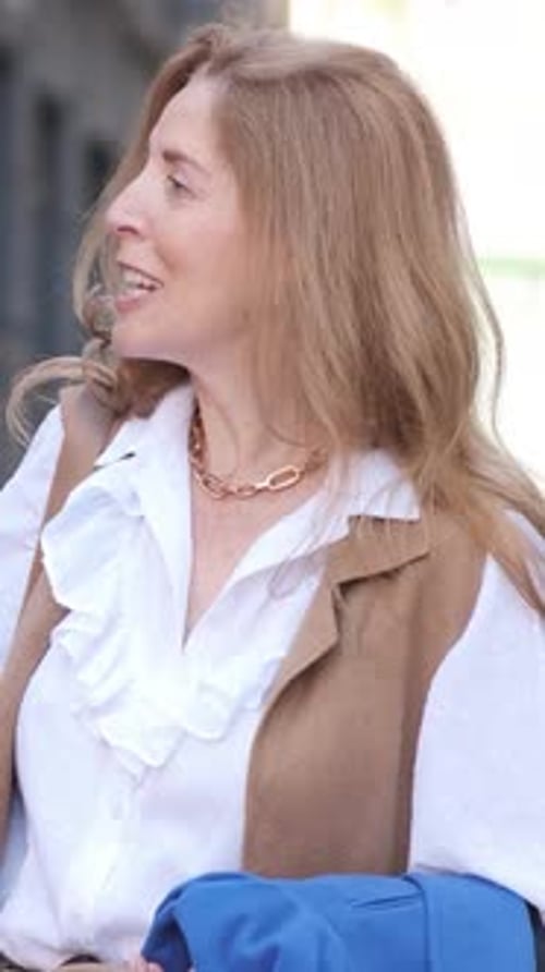Mature Woman Close Up Talking in the Street Vertical Footage Slow Motion