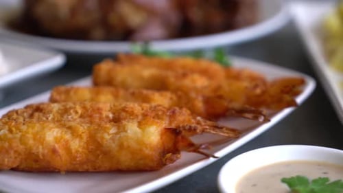 Crispy Fried Prawns and Cuisine Display