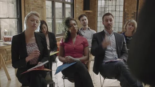 Diverse Group Listens Attentively in a Meeting