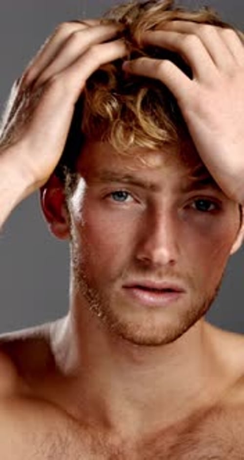 Face, hair care and man in studio, beauty and dermatology with wellness on gray background