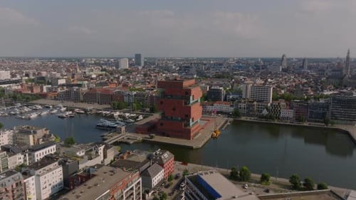 Aerial Views Highlight the MAS Museum Aan De Stroom and the Lively City of Antwerp Boats Glide Along