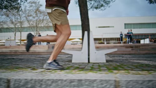 Athletic Legs Start Jogging on Sunny Street Closeup Motivated Sportsman Train