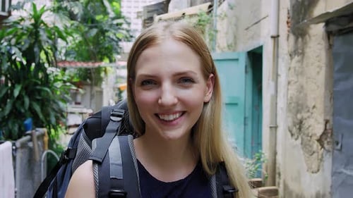Portrait of Beautiful Backpacker Tourist Girl Smiling at Camera on Bangkok Asian