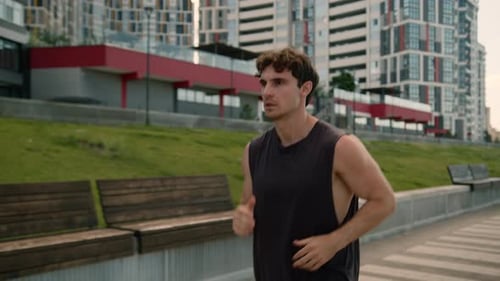 Caucasian European Young Man Running Runner Male Guy Athlete Sport City Motivated Jog Outdoors