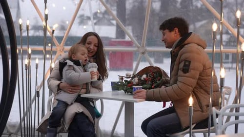 Happy Family Outing in Winter Dome