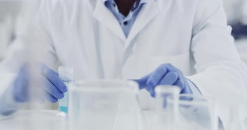 Glass flask, laboratory and scientist man in research, medical analysis and exam