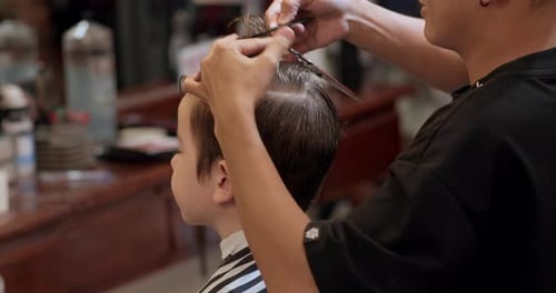 Child's Haircut at a Bright Barbershop