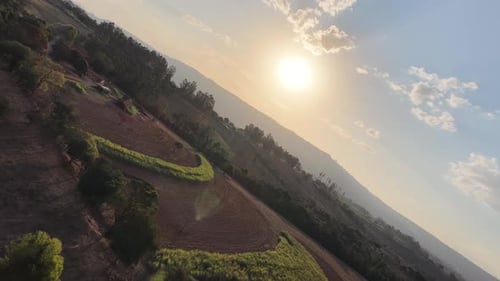 Peaceful Sunset Landscape at Scenic Green Valley Mountains.