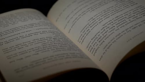 Open Book with Turning Pages Close Up