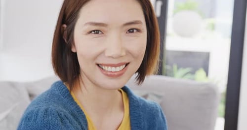 Close Up of Woman Smiling Indoors