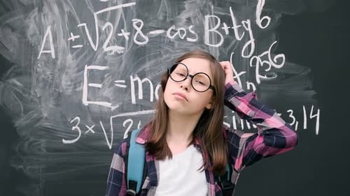 Student Gets Idea in Front of Chalkboard