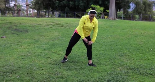 Curvy Woman Doing Stretching Outdoor At City Park - Plus Size And Workout Sport Exercises