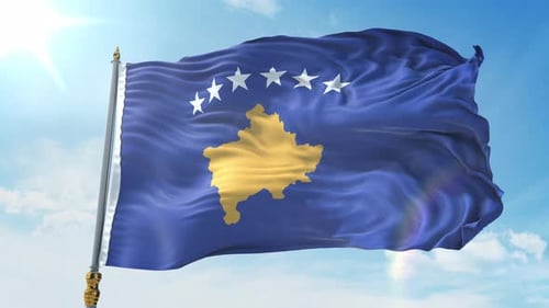 Realistic Kosovo Flag Waving on Flagpole Against Blue Sky
