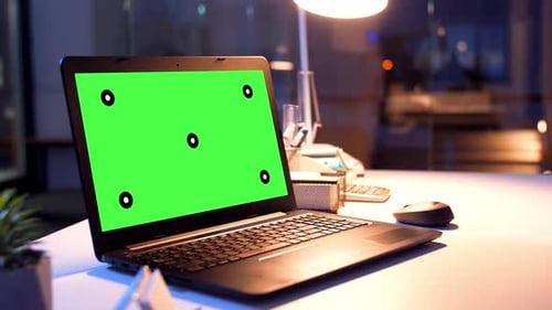 Business, Deadline And Interior Concept - Laptop Computer With Chroma Key Green Screen On Table A...
