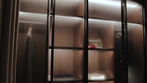 Elegant Walk-In Closet Display with Soft Lighting