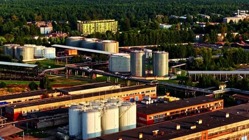Aerial View of Industrial Factory with Storage Tanks