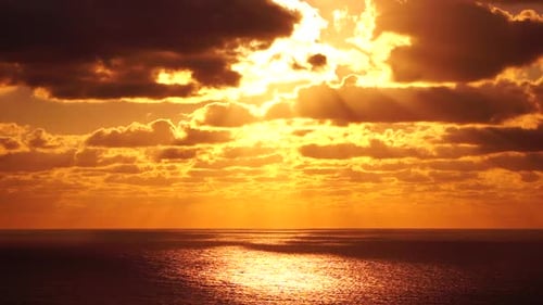Golden Hour Sea Video Sun Setting Over Water Peaceful Scenery Horizon View Aerial View Dramatic