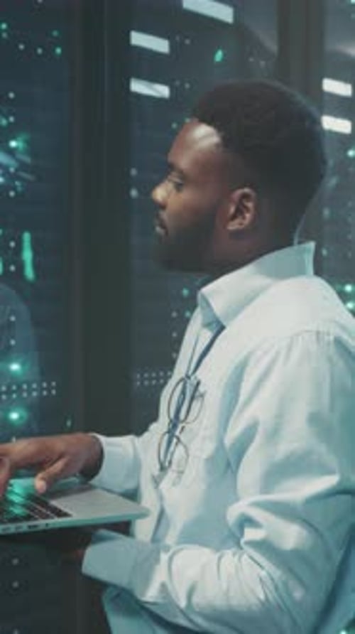 IT technician working in a server room