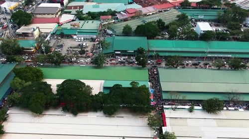 aerial drone viewing the crowded traffic side street, top down shot from Taytay Tiangge, Philippines