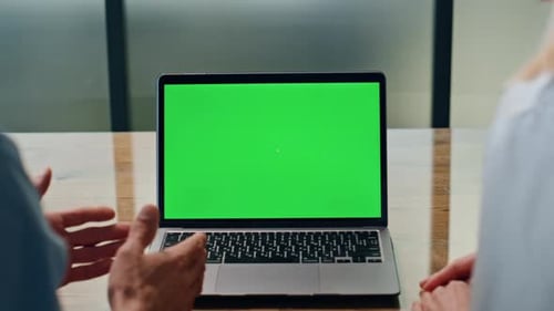Business Meeting Using Laptop with Green Screen