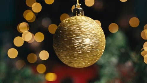 Gold Christmas Ornament with Twinkling Holiday Lights