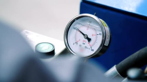 Industrial Manometer Pressure Readings in Workshop