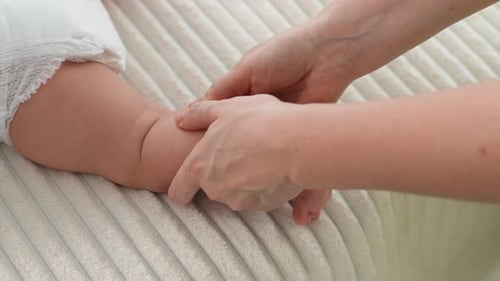 Infant Arm Receiving a Gentle Massage
