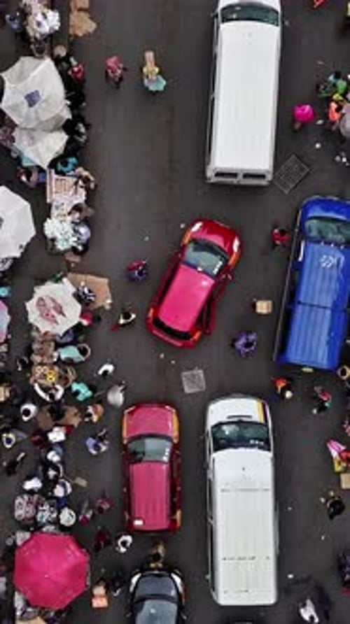 Vibrant market activity in Accra, Ghana captured from an aerial view